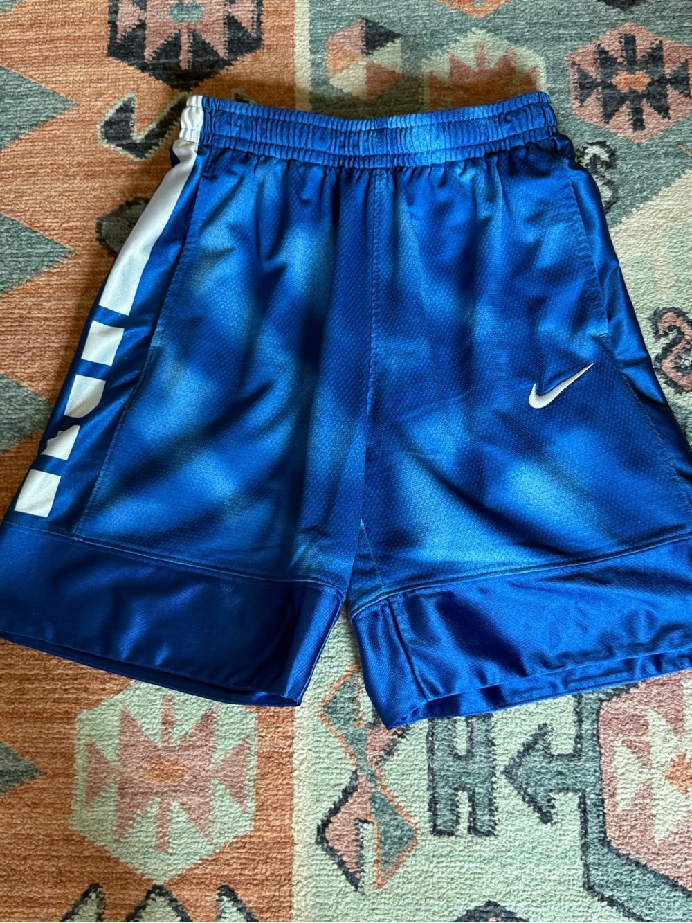 Nike Kids Blue Athletic Shorts with White Swoosh